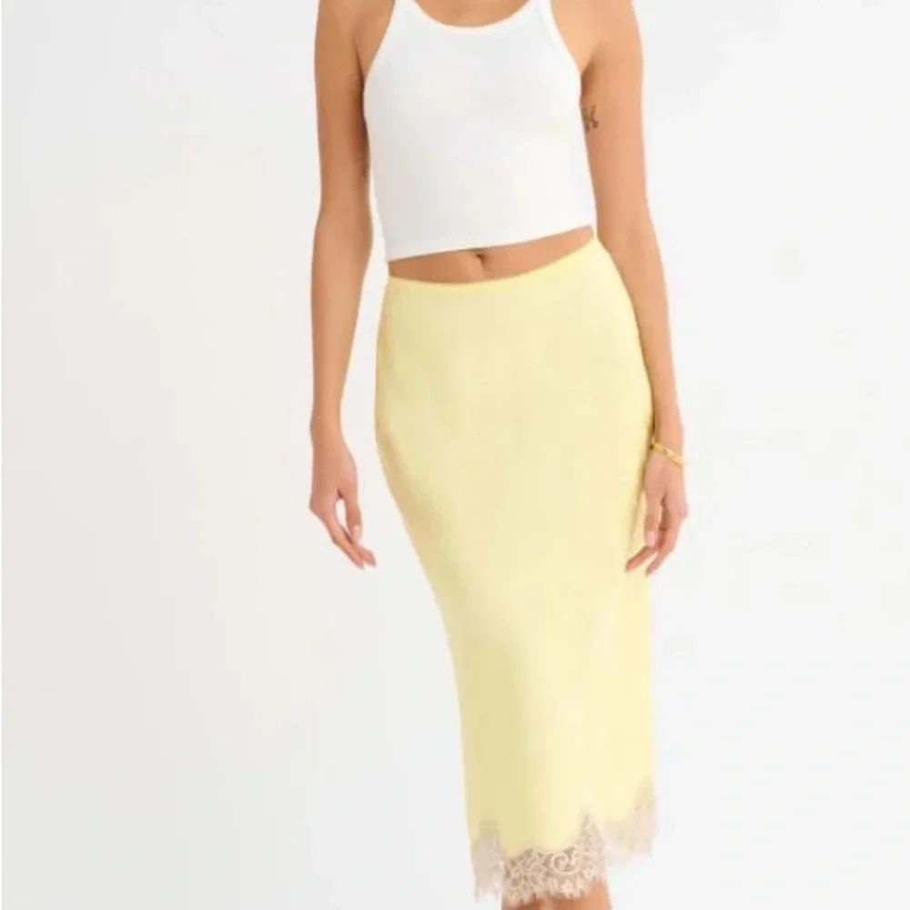 Rumored Pale Yellow Midi Skirt with Lace Hem